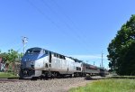 Unrebuilt P40:# 838 pushes Ctrail Train # 6402 away from Devine Street